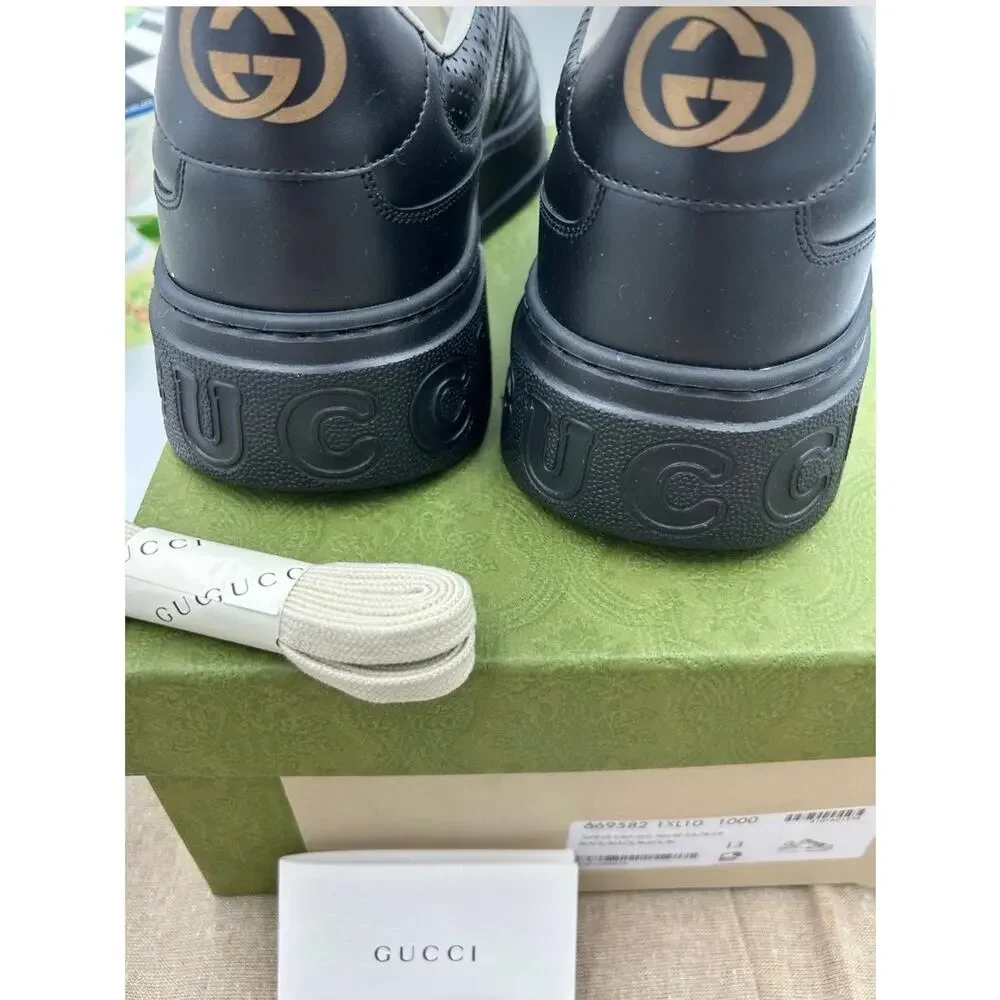 Men's Gucci, GG embossed leather sneakers size 13 fits 13.5 US made in Italy